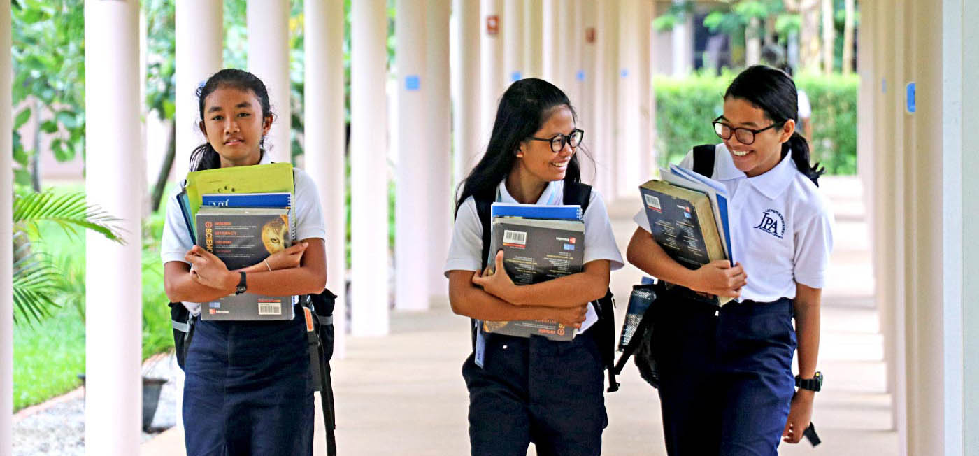 JPA high school students walking to class.  Jay Pritzker Academy, Siem Reap, Cambodia. Jay-Pritzker-Academy-Siem-Reap-Cambodia.